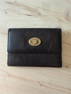 Burberrys Vintage Brown Leather Bifold Wallet with Gold Emblem
